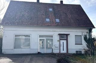 Einfamilienhaus kaufen in 59329 Wadersloh, Einfamilienhaus mit Gewerberaum und großem Baugrundstück im Herzen Waderslohs