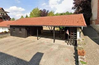 Grundstück zu kaufen in 37581 Bad Gandersheim, Vielseitiges Grundstück in Dannhausen: Carportanlage mit Ausbaupotenzial!