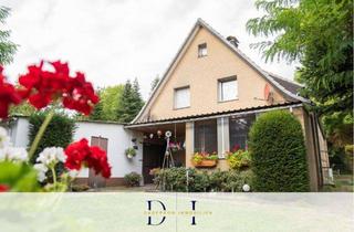 Doppelhaushälfte kaufen in 33428 Harsewinkel, Doppelhaushälfte auf großem Grundstück – neuwertige Pelletheizung inklusive