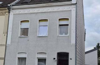 Haus kaufen in 47441 Moers, Notverkauf eines vermieteten Dreifamilienhauses mit Nebengebäude