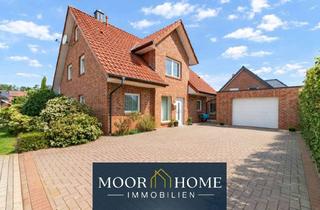 Einfamilienhaus kaufen in 48488 Emsbüren, Einfamilienhaus in Emsbüren mit Kamin, Garage und pflegeleichtem Garten
