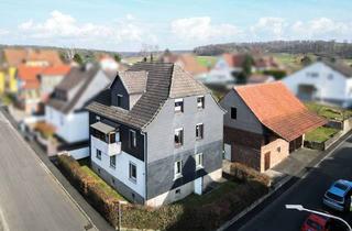Haus kaufen in 35279 Neustadt, Zweifamilienhaus mit Scheune in guter Lage von Neustadt
