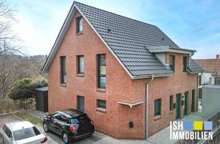 Wohnung kaufen in 21680 Stade, Stade: Junge und moderne Eigentumswohnung im ansprechenden Doppelhaushälften-Charakter