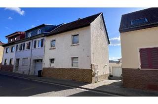 Einfamilienhaus kaufen in 55218 Ingelheim, Ingelheim am Rhein - Charmantes Einfamilienhaus mit Dachterrasse, Garage & Potenzial