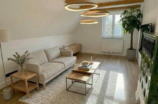 Wohnung kaufen in 85757 Karlsfeld, Karlsfeld - Exklusives Wohnerlebnis: Kernsanierte Ruheoase bei München