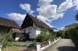 Einfamilienhaus kaufen in 65428 Rüsselsheim, *Freistehendes Ein-/Zweifamilienhaus mit 560 m² Grundstück, Doppelgarage & Garten*