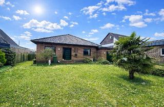 Haus kaufen in 27798 Hude, Hude (Oldenburg) - Zeitlose Architektur: Lichtdurchfluteter Bungalow-Klassiker mit viel Stauraum.