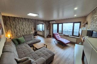 Mehrfamilienhaus kaufen in 61184 Karben, Karben - Penthouse mit tollem Westblick zum Taunus (provisionsfrei)