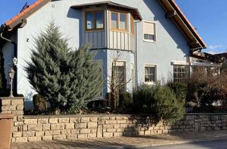 Einfamilienhaus kaufen in 97232 Giebelstadt, Einfamilienhaus mit Einliegerwohnung, Doppelgarage und Garten in Giebelstadt-Sulzdorf