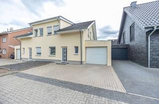 Doppelhaushälfte kaufen in 48268 Greven, Moderne Doppelhaushälfte mit Garten, Garage und neuer Fassade