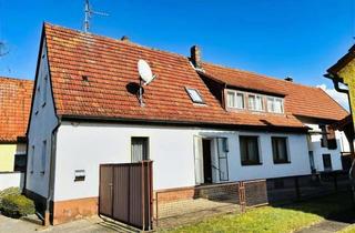 Haus kaufen in 97437 Haßfurt, Geräumiges Einfam.-Wohnhaus mit Anbau, Nebengebäude und unterkellerter Garage in zentraler Lage, G