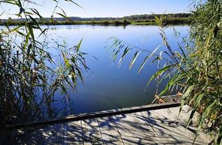 Haus kaufen in 39264 Jütrichau, Zerbst (Anhalt) - Bungalow direkt am See mit Steg und Boot
