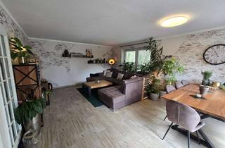Wohnung kaufen in 25761 Büsum, Moderne 3-Zimmer-Erdgeschosswohnung mit Wintergarten, zwei Terrassen und Garten in Büsum