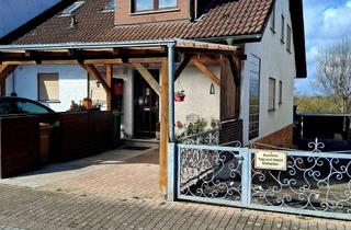 Wohnung kaufen in 69226 Nußloch, Charmante Dachgeschosswohnung mit Balkon in ruhiger Lage von Nußloch