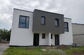 Doppelhaushälfte kaufen in 33129 Delbrück, Moderne Neubau-Doppelhaushälften in ruhiger Lage von Delbrück‑Lippling!
