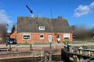 Doppelhaushälfte kaufen in 26802 Moormerland, RESERVIERT - Doppelhaushälfte mit großem Grundstück und Bebauungspotenzial