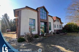 Anlageobjekt in 16868 Wusterhausen, Wohnen auf höchstem Niveau: Exklusives Ensemble aus zwei Wohneinheiten und Premium-Gewerbe