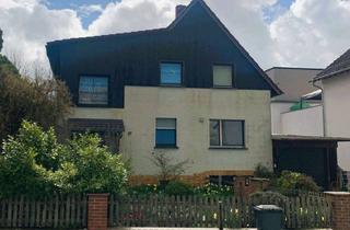 Haus kaufen in Flörsheimer Strasse 27, 65474 Bischofsheim, Freistehendes 2-Familienhaus + Einliegerwohnung mit großem Garten