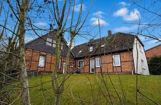 Anlageobjekt in 29683 Bad Fallingbostel, Solides Zinshaus mit 6 Wohneinheiten und 4 Garagen! Faktor 15,3