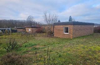 Haus kaufen in 66802 Überherrn, Überherrn - Bungalow mit großem Garten in ruhiger Lage