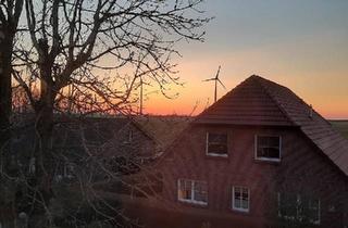 Wohnung kaufen in 26969 Butjadingen, Butjadingen - Wohnnung mit Weitblick auf Deich und Hafen