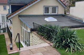 Wohnung kaufen in 76530 Innenstadt, Einzigartige Stadtwohnung mit eigenem Garten & Turm in Bestlage von Baden-Baden