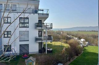 Wohnung kaufen in 65510 Idstein, Stilvolles Wohnen: Helle Neubauwohnung mit Balkon, TG-Stellplatz & Top-Ausstattung in Idstein