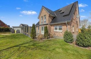 Einfamilienhaus kaufen in 25873 Rantrum, Neuwertiges Einfamilienhaus mit Wärmepumpe, PV-Anlage und Doppelgarage in traumhafter Sackgassenlage