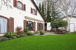Einfamilienhaus kaufen in 67269 Grünstadt, Wohnen mit Wohlfühlgarantie – EFH mit ELW, traumhaftem Sonnengarten und Wellnessbereich