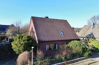 Haus kaufen in 49843 Uelsen, Zweifamilienhaus in schöner Lage von Uelsen