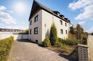 Doppelhaushälfte kaufen in Reislinger Str. 71, 38446 Hellwinkel, Attraktive Doppelhaushälfte mit 3 Wohneinheiten, Balkon & Garagen auf großzügigem Grundstück