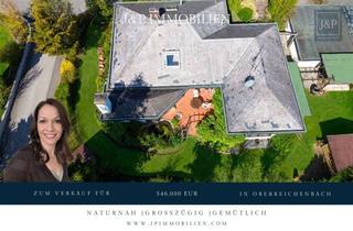 Haus kaufen in 91097 Oberreichenbach, Zeitlose Eleganz der 70er: weitläufiger Bungalow mit Wintergarten-Oase und offenem Kamin