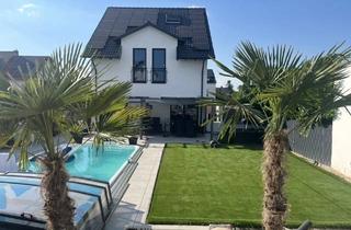 Einfamilienhaus kaufen in 67158 Ellerstadt, Modernes Einfamilienhaus (Bj. 2022) mit Pool, PV-Anlage & großem Grundstück in Ellerstadt