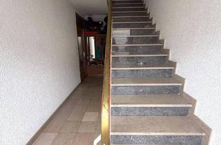 Haus kaufen in 66787 Wadgassen, Wadgassen - Vermietetes Zweifamilienhaus mit Garten und Garage in 66787 Wadgassen zu verkaufen