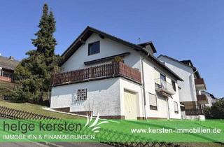 Haus kaufen in 34326 Morschen, Morschen - Dreifamilienhaus mit Potenzial und tollem Ausblick über Altmorschen zu verkaufen!