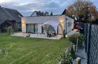 Haus kaufen in 32584 Löhne, Löhne - Neuwertiger Bungalow mit Südterrasse und Garten