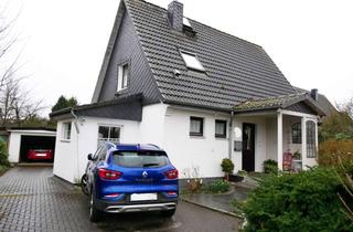 Einfamilienhaus kaufen in 25474 Hasloh, Großzügiges Einfamilienhaus mit Keller, Garage & Nebengebäude in ruhiger Lage