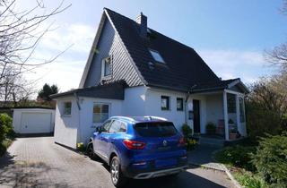 Einfamilienhaus kaufen in 25474 Hasloh, Großzügiges Einfamilienhaus mit Keller, Garage & Nebengebäude in ruhiger Lage