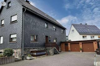 Haus kaufen in 56477 Rennerod, Einladendes Wohnhaus mit geräumiger Scheune und Garagen im Herzen von Rennerod !