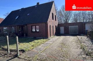 Doppelhaushälfte kaufen in 25764 Wesselburen, Doppelhaushälfte auf großem Grundstück vor den Toren von Büsum