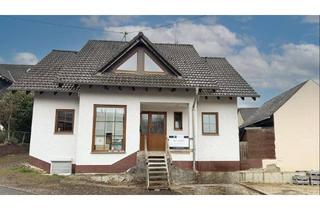 Mehrfamilienhaus kaufen in 56291 Wiebelsheim, Mehrfamilienhaus mit 3 Einheiten und Scheune – attraktive Kapitalanlage in Wiebelsheim