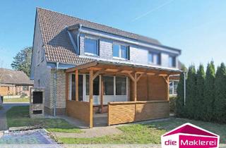 Doppelhaushälfte kaufen in 24635 Daldorf, Solide und charmante Doppelhaushälfte in gepflegtem Wohnumfeld