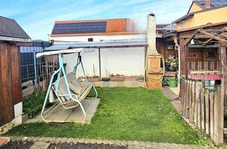 Einfamilienhaus kaufen in 67136 Fußgönheim, Ein Zuhause zum Verlieben – Freistehendes Einfamilienhaus mit Gartenidylle, Fischteich & Balkon