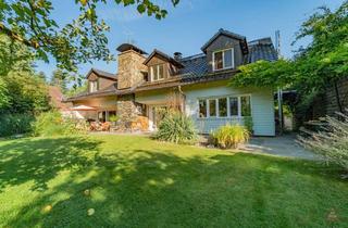 Einfamilienhaus kaufen in 85598 Baldham, Exklusives Einfamilienhaus – mit Wellnessbereich, Kamin und Traumgarten