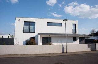 Haus kaufen in 64807 Dieburg, Lichtdurchflutetes Bauhaus für Familie in begehrter Lage von Dieburg Energieeffizienzklasse A+