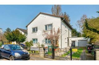 Mehrfamilienhaus kaufen in 64546 Mörfelden-Walldorf, Teilvermietetes Mehrfamilienhaus mit 3 Wohneinheiten, Nebengebäude und Garten in beliebter Lage