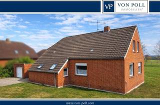 Einfamilienhaus kaufen in 26632 Ihlow, Charmantes Landhaus mit Wirtschaftsteil, Garage und großem Garten in Ihlow-Simonswolde