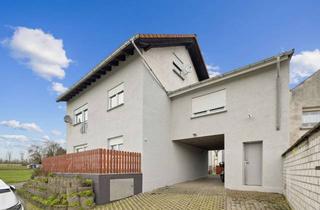 Einfamilienhaus kaufen in 65614 Beselich, Attraktives Investitionsobjekt mit stabiler Mieterstruktur