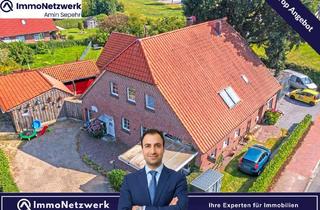Haus kaufen in 26188 Edewecht, Dreifamilienhaus mit großem Grundstück – ideal für Eigennutzer und Investoren