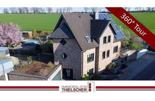 Einfamilienhaus kaufen in 52511 Geilenkirchen, Geilenkirchen / Müllendorf - Großes freistehendes Einfamilienhaus mit 2 Garagen, Wintergarten und idyllischem Garten am Feldrand